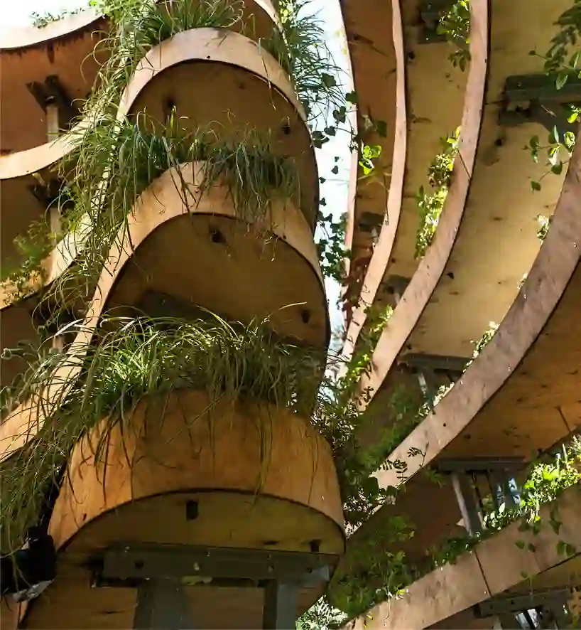 The Infinite Green viewed from above, planted shelves in concentric levels.